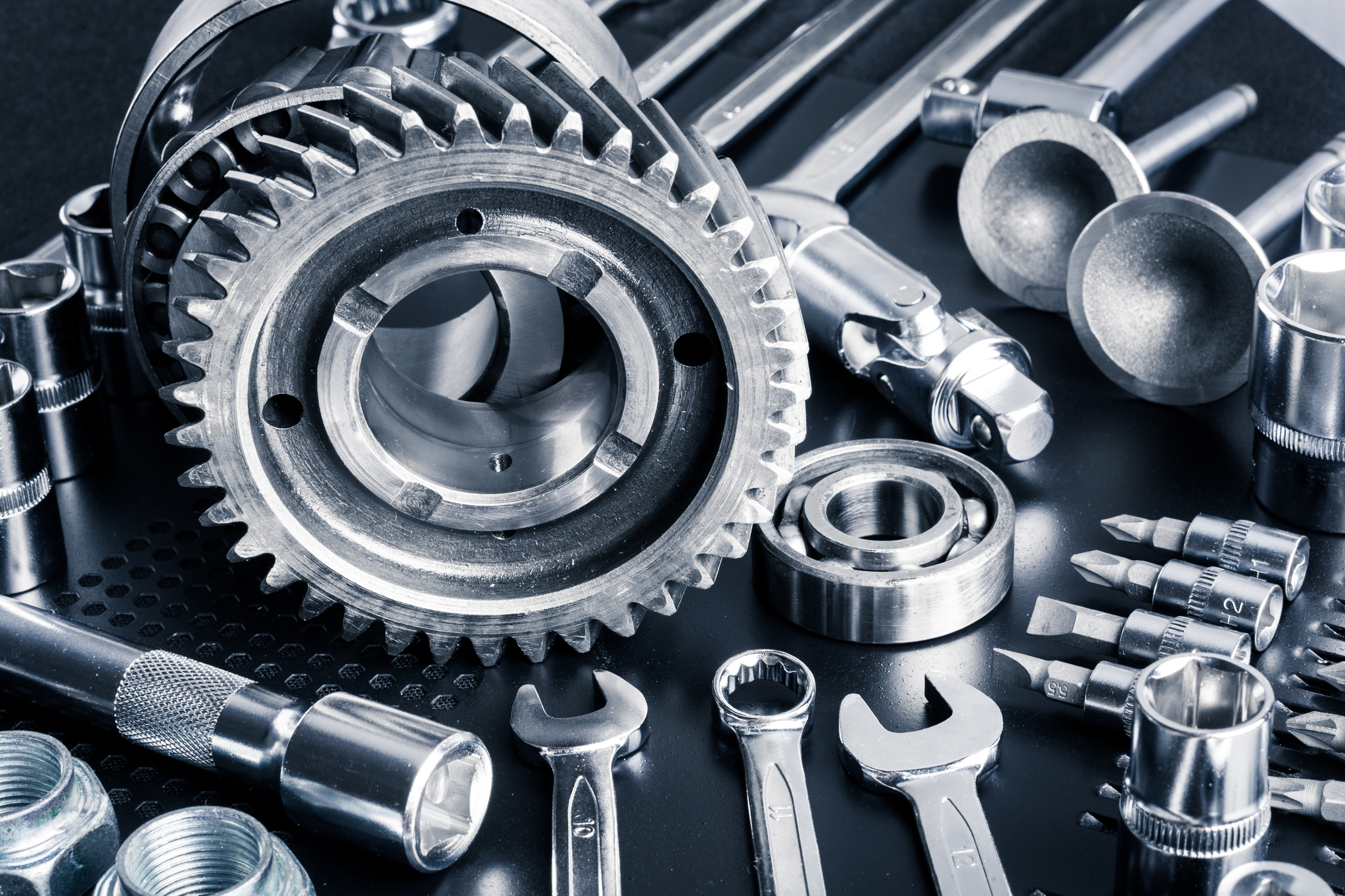 Industrial tooling and metal components arranged together